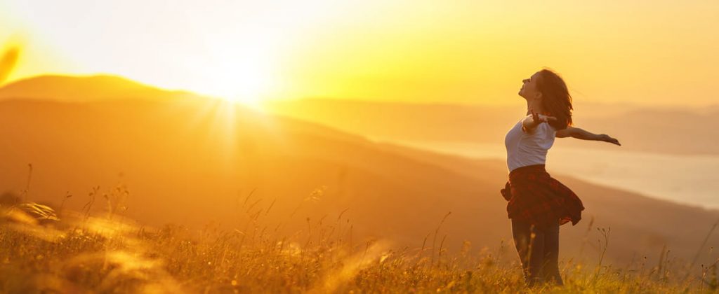 Woman soaking sunshine and receiving vitamin D in the process a part of the overall healthcare provided by our endocrinologists who are specialty doctors in Idaho Falls and Pocatello.