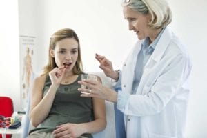 A doctor providing medication for a patient involved in a clinical study as part of our endocrine specialty and diabetes doctor care in Idaho Falls and Pocatello.