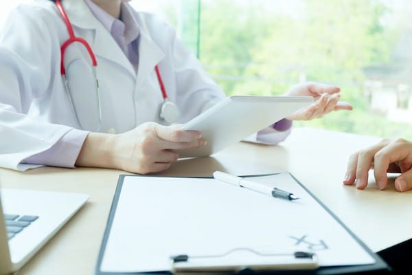 One of our endocrinology specialty doctors in Idaho Falls or Pocatello consulting with a patient.