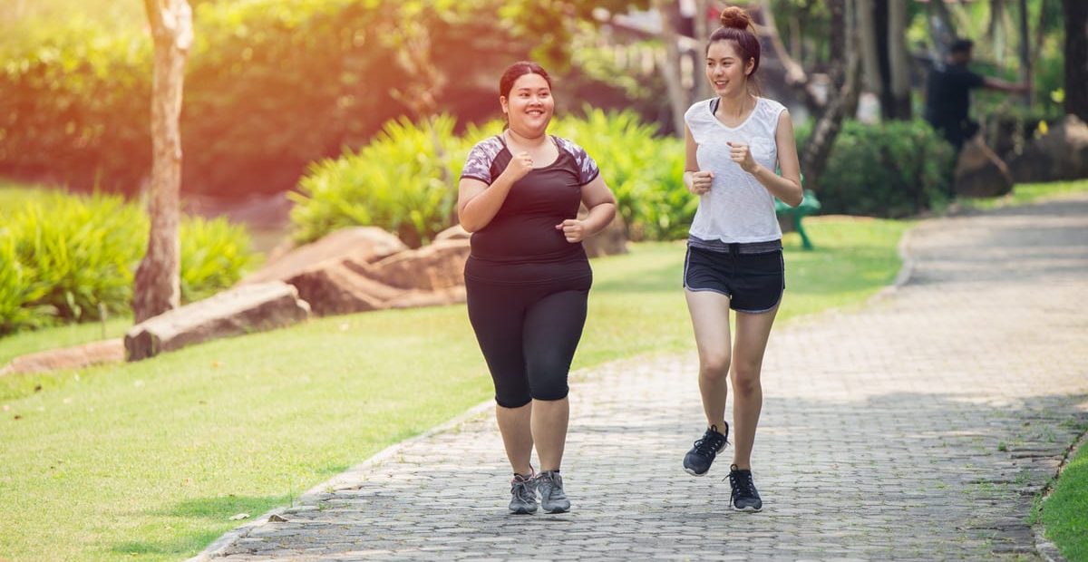 Two girls running in the park, one has insulin resistance being treated by a diabetes doctor in Idaho Falls and Pocatello at Rocky Mountain Diabetes Center.