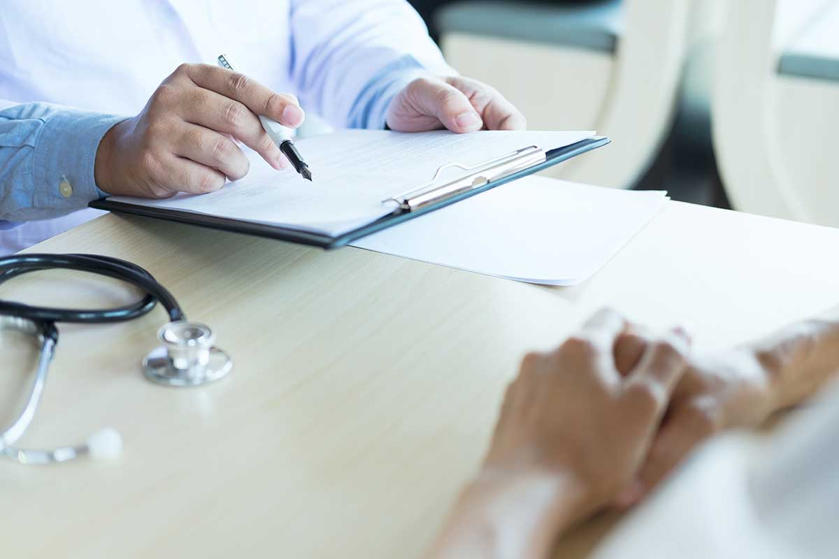 A doctor reviewing the Express Lab laboratory results to provide appropriate endocrine care like for diabetes in Idaho Falls and Pocatello.