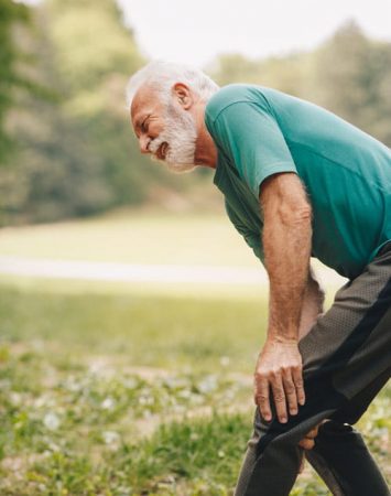 Man suffering from knee pain and needing to see one of our endocrinology specialists in Idaho Falls or Pocatello.