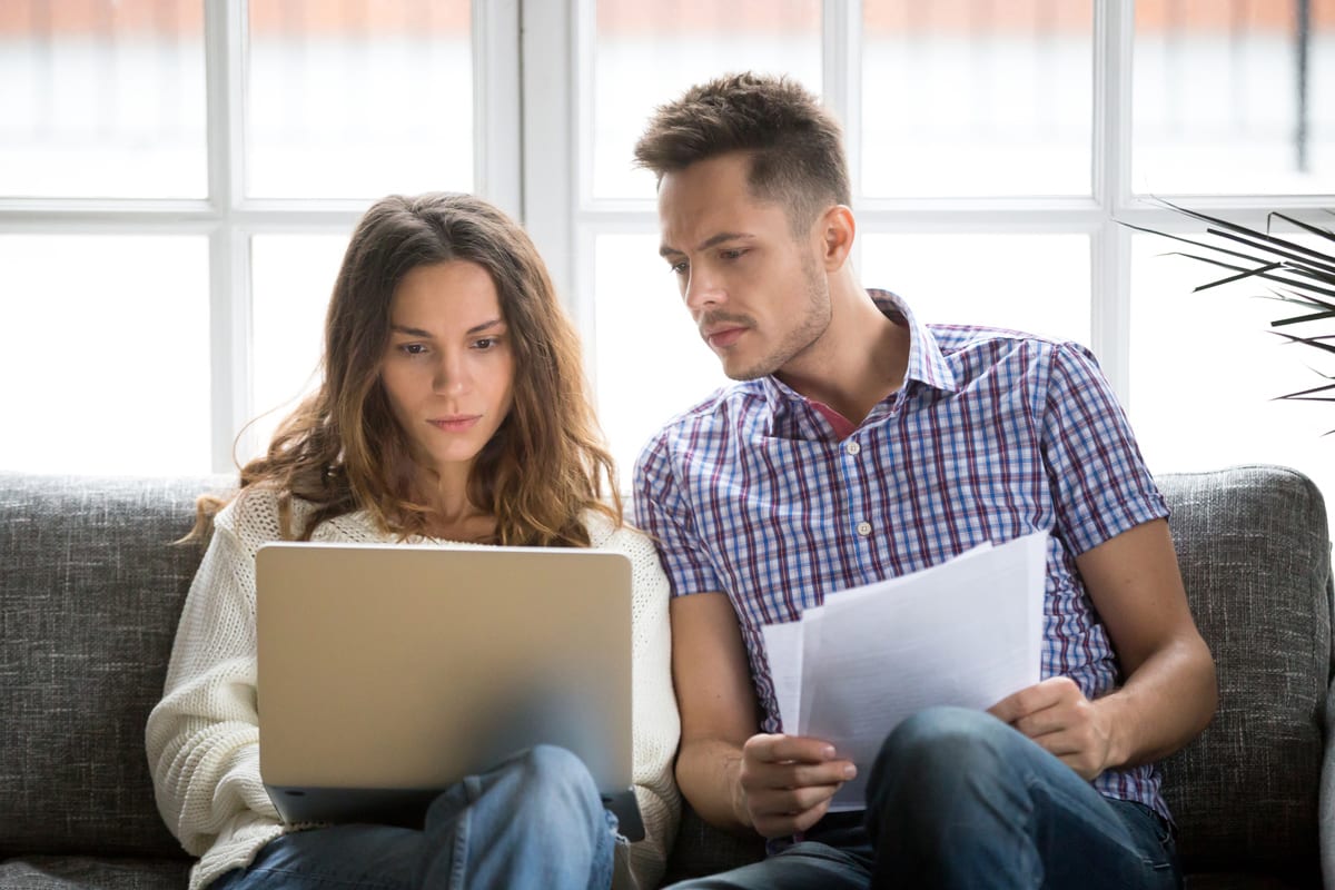 A couple looking at a laptop computer after becoming patients of Rocky Mountain Diabetes center in Idaho Falls and Pocatello.